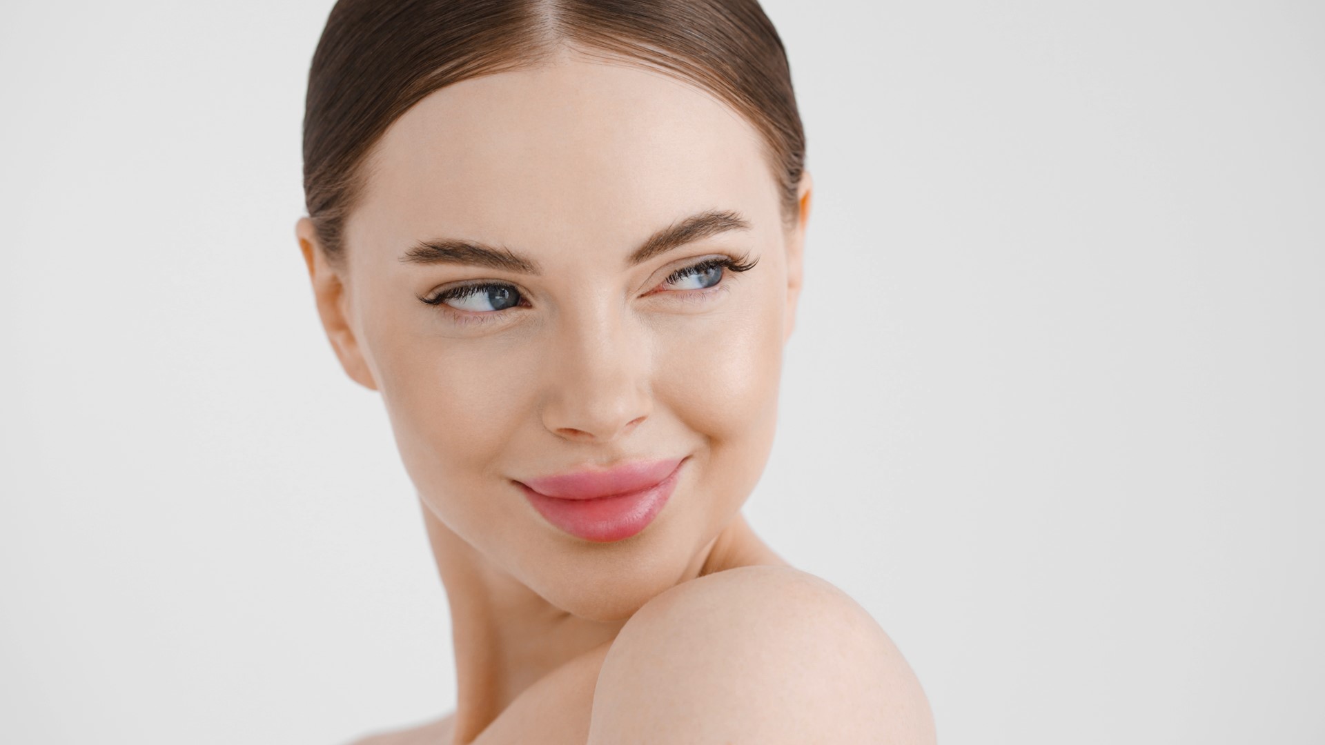 img of woman's clear face and skin after NOUVADerm laser treatment